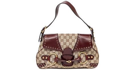 blazing saddles gucci bag|Gucci sling bag women.